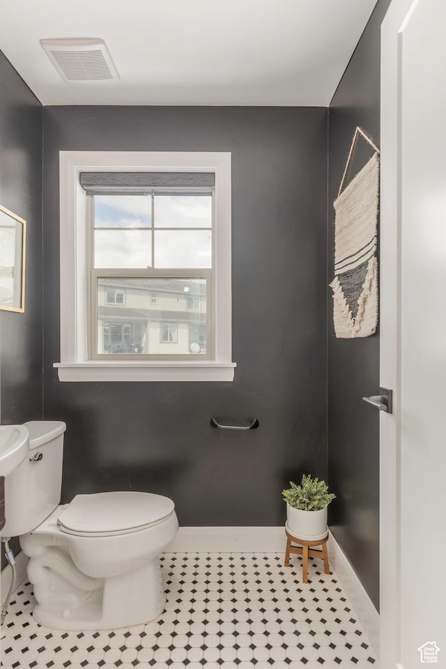 1052 W Cattail Ct Unit E1, Kamas, UT 84036 - bathroom featuring toilet, tile patterned flooring, visible vents, and baseboards