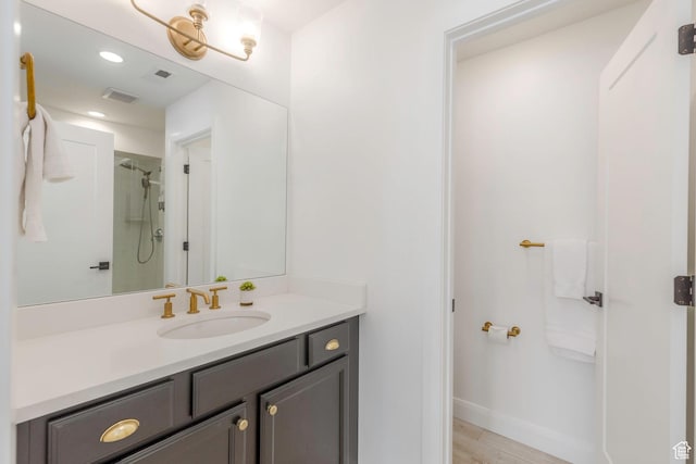 1052 W Cattail Ct Unit E1, Kamas, UT 84036 - bathroom featuring vanity, walk in shower, baseboards, visible vents, and recessed lighting