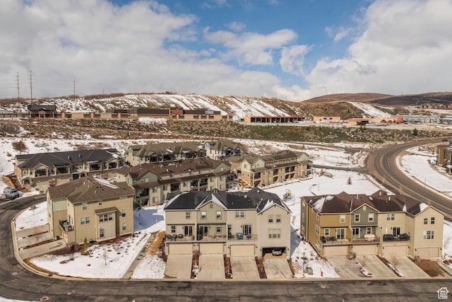 1052 W Cattail Ct Unit E1, Kamas, UT 84036 - snowy aerial view with a mountain view and a residential view
