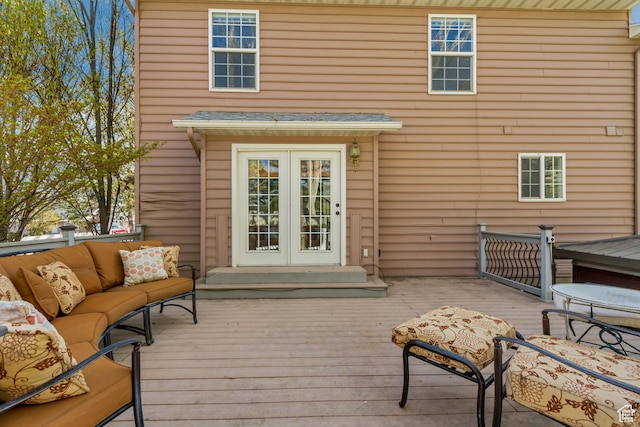 deck with an outdoor hangout area and french doors