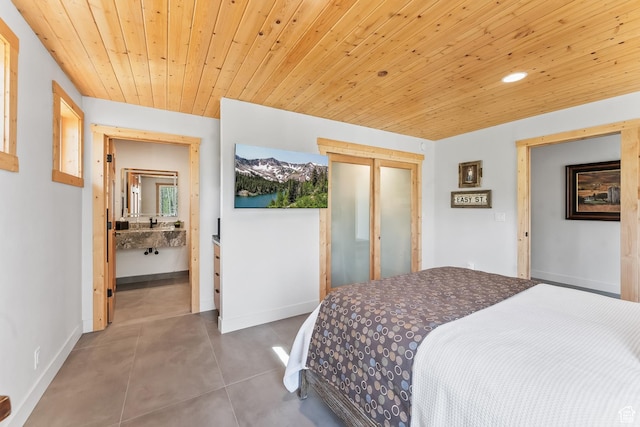 10351 N Kimball Canyon Rd Unit 14, Park City, UT 84098 - tiled bedroom featuring baseboards, a closet, and wooden ceiling