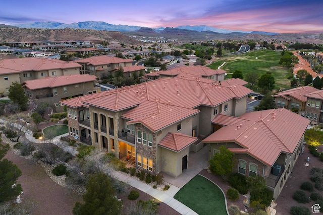 drone / aerial view with a residential view and a mountain view