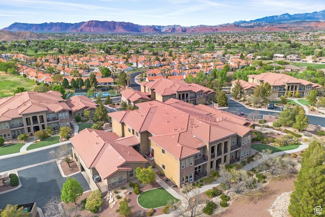 birds eye view of property with a residential view and a mountain view