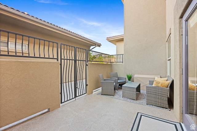 view of patio / terrace with a balcony