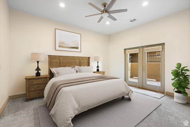 bedroom featuring light carpet, access to outside, french doors, and visible vents