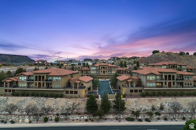 exterior space featuring a mountain view and a residential view