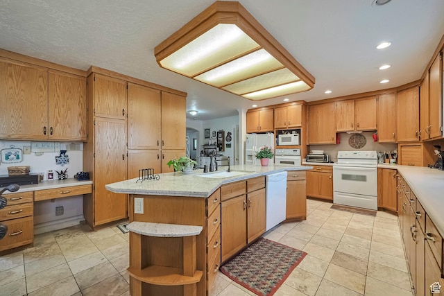 kitchen featuring a kitchen island with sink, a sink, recessed lighting, white appliances, and open shelves