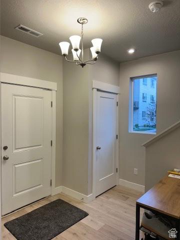413 S 980 W, American Fork, UT 84003 - interior space with baseboards, recessed lighting, visible vents, light wood-style floors, and a chandelier