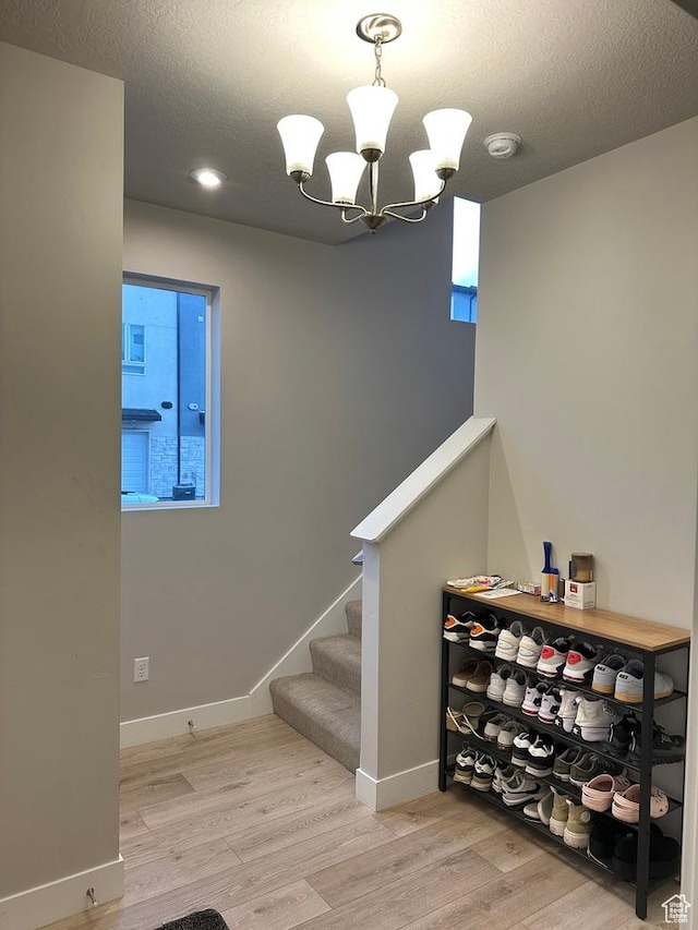 413 S 980 W, American Fork, UT 84003 - staircase featuring baseboards, a notable chandelier, wood finished floors, and recessed lighting