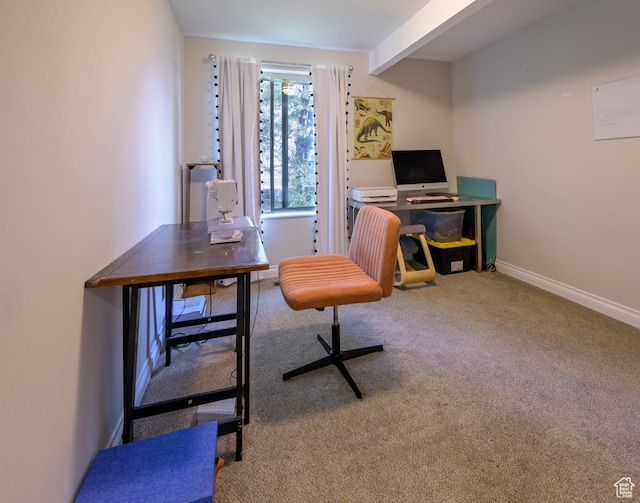 home office featuring baseboards and carpet floors
