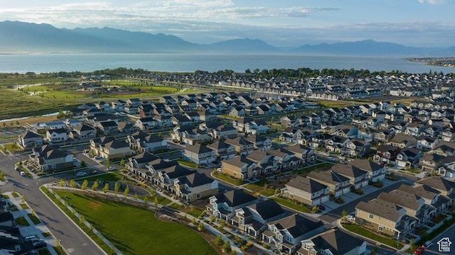 947 N Riverside Dr Unit 977, Saratoga Springs, UT 84045 - drone / aerial view featuring a residential view and a water and mountain view