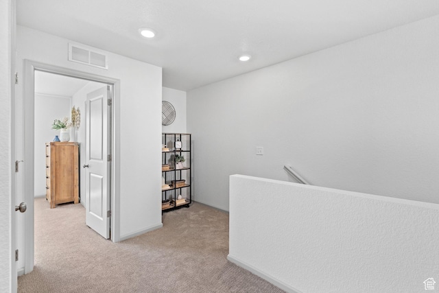 947 N Riverside Dr Unit 977, Saratoga Springs, UT 84045 - corridor with an upstairs landing, light carpet, baseboards, visible vents, and recessed lighting