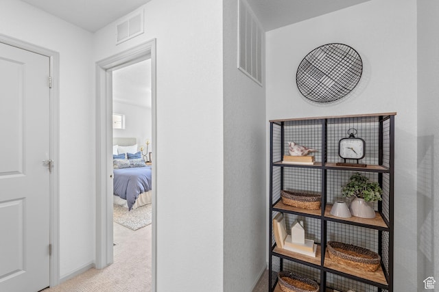 947 N Riverside Dr Unit 977, Saratoga Springs, UT 84045 - corridor featuring visible vents, carpet flooring, and baseboards