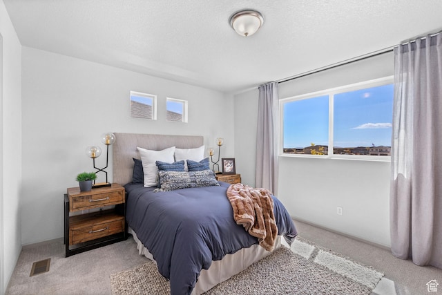 947 N Riverside Dr Unit 977, Saratoga Springs, UT 84045 - bedroom with visible vents, carpet flooring, and multiple windows