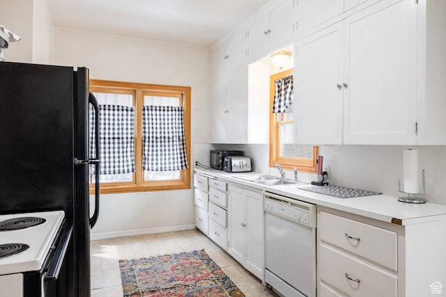 79 E Hillside Ave, Salt Lake City, UT 84103 - kitchen with white cabinets, light countertops, a sink, electric range, and dishwasher