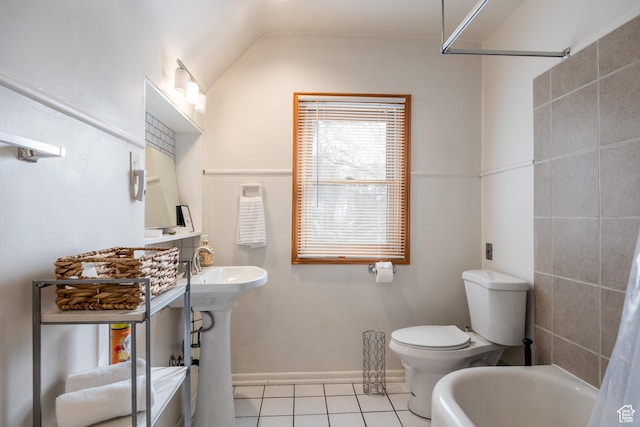 79 E Hillside Ave, Salt Lake City, UT 84103 - bathroom featuring a bidet, baseboards, toilet, lofted ceiling, and tile patterned flooring