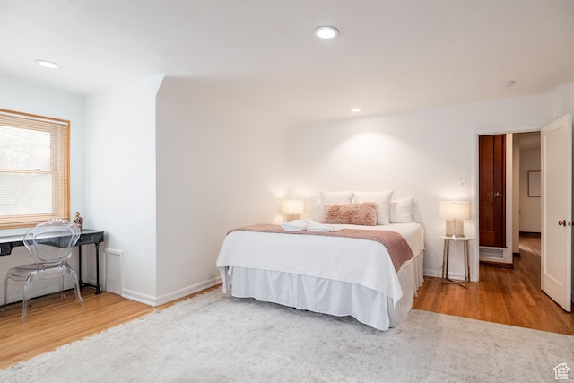 79 E Hillside Ave, Salt Lake City, UT 84103 - bedroom with baseboards, wood finished floors, and recessed lighting