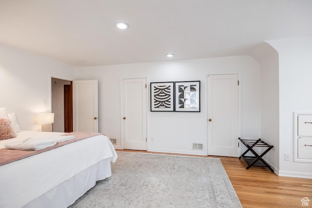 79 E Hillside Ave, Salt Lake City, UT 84103 - bedroom featuring baseboards, recessed lighting, visible vents, and light wood-style flooring