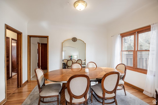 79 E Hillside Ave, Salt Lake City, UT 84103 - dining space featuring light wood finished floors and baseboards