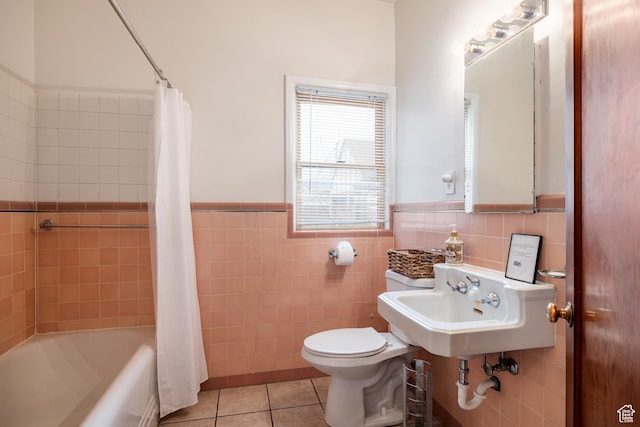 79 E Hillside Ave, Salt Lake City, UT 84103 - full bath featuring tile patterned floors, a sink, toilet, tile walls, and wainscoting