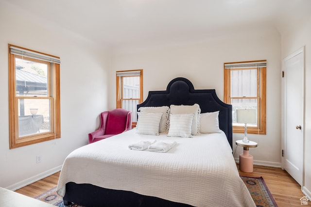 79 E Hillside Ave, Salt Lake City, UT 84103 - bedroom with baseboards and light wood finished floors