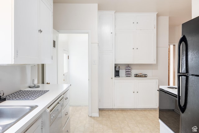 79 E Hillside Ave, Salt Lake City, UT 84103 - kitchen with white cabinets, light countertops, white dishwasher, freestanding refrigerator, and electric range oven