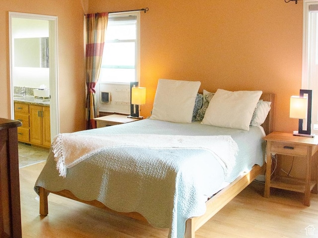 1849 E Gracey Ln S, Sandy, UT 84092 - bedroom featuring light wood-style flooring and ensuite bathroom