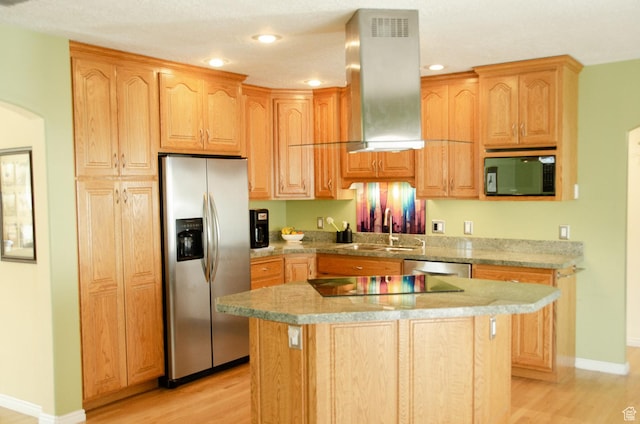 1849 E Gracey Ln S, Sandy, UT 84092 - kitchen with island exhaust hood, stainless steel fridge, a sink, baseboards, and light wood-style floors