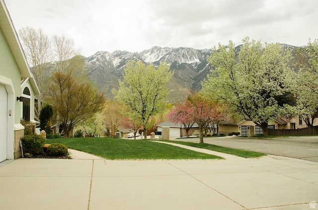 1849 E Gracey Ln S, Sandy, UT 84092 - view of community with a lawn and a mountain view