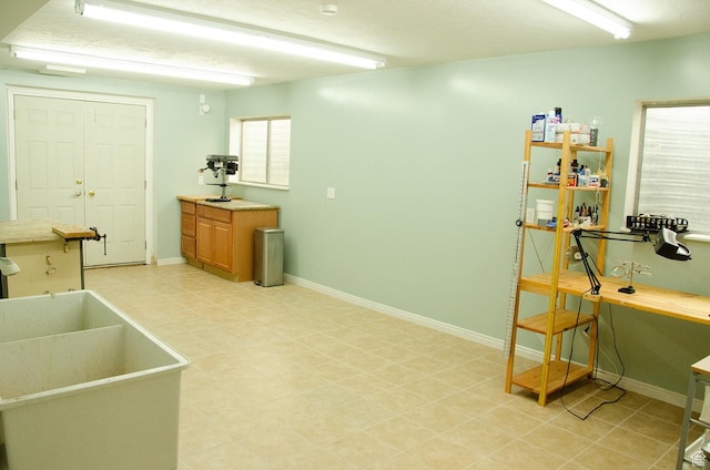 1849 E Gracey Ln S, Sandy, UT 84092 - interior space with light floors, baseboards, and a sink