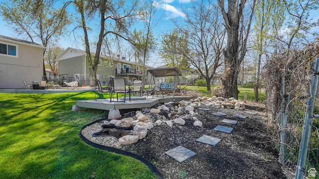 view of yard with a wooden deck
