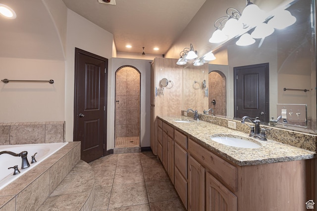 5095 N Ridgeview Cir, Enoch, UT 84721 - full bathroom featuring a bath, a sink, double vanity, and tiled shower