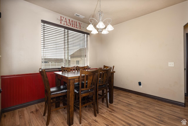 5095 N Ridgeview Cir, Enoch, UT 84721 - dining room with a chandelier, wood finished floors, visible vents, and baseboards