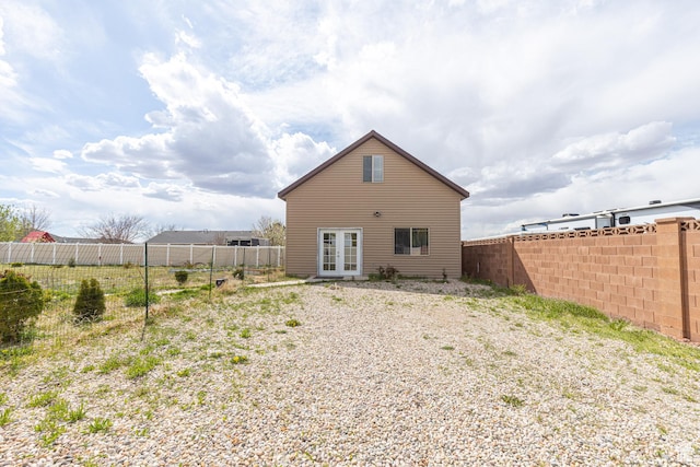 5095 N Ridgeview Cir, Enoch, UT 84721 - rear view of property featuring a fenced backyard and french doors