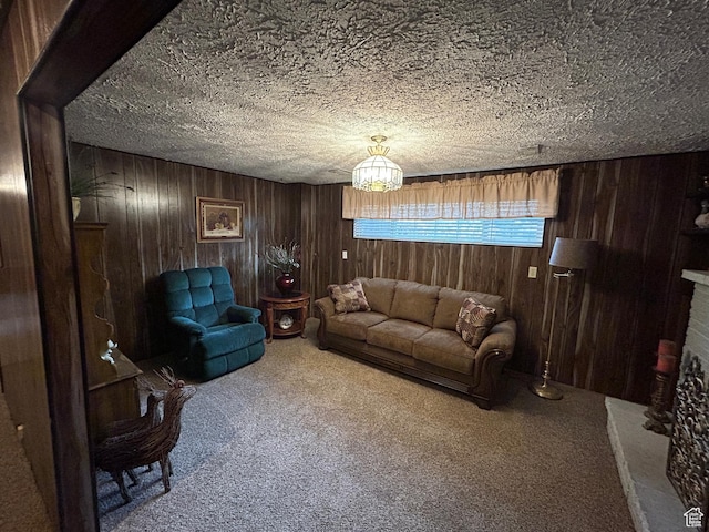 3748 W 5140 S, Taylorsville, UT 84129 - living room featuring a brick fireplace, wood walls, carpet, and a textured ceiling