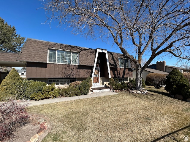 3748 W 5140 S, Taylorsville, UT 84129 - view of front of house with a shingled roof, a front lawn, and mansard roof