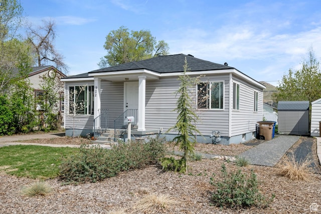 922 N Colorado St, Salt Lake City, UT 84116 - view of front of house featuring a storage unit and an outbuilding