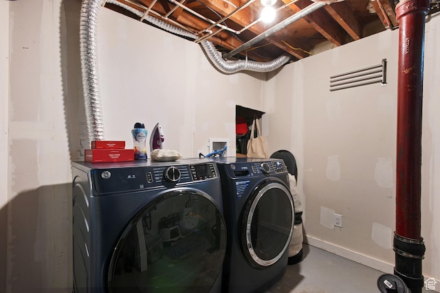 922 N Colorado St, Salt Lake City, UT 84116 - washroom with baseboards and washer and dryer