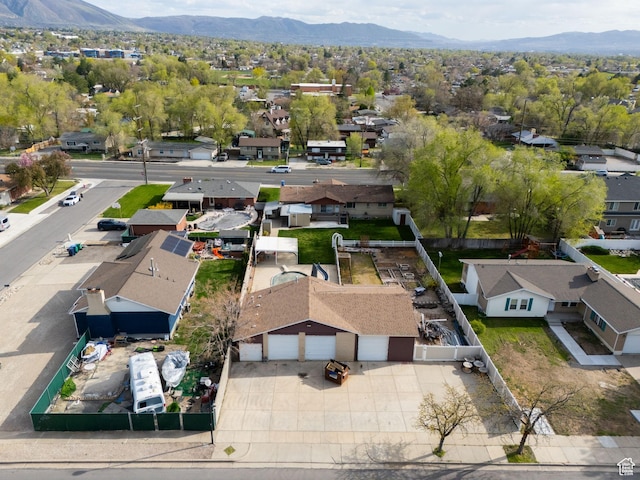 bird's eye view with a residential view and a mountain view