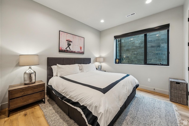 11431 N Ursa Cir Unit 56, Heber City, UT 84032 - bedroom with baseboards, light wood-style floors, visible vents, and recessed lighting