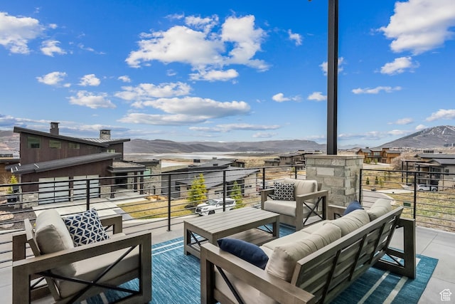 11431 N Ursa Cir Unit 56, Heber City, UT 84032 - view of patio featuring outdoor lounge area, a balcony, and a mountain view