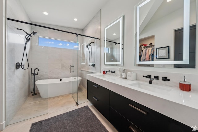 11431 N Ursa Cir Unit 56, Heber City, UT 84032 - bathroom with a soaking tub, a sink, double vanity, and a stall shower