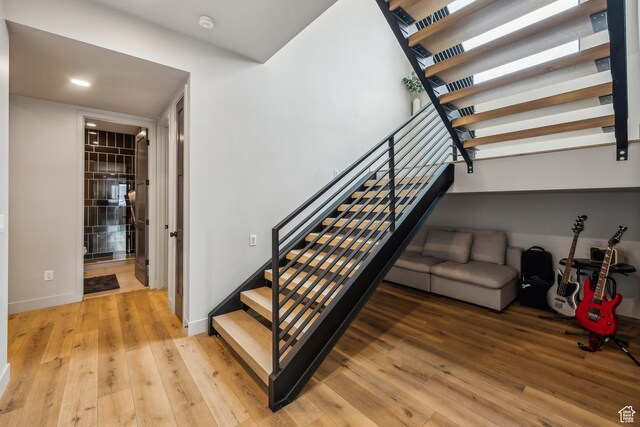 11431 N Ursa Cir Unit 56, Heber City, UT 84032 - staircase with recessed lighting, wood finished floors, and baseboards