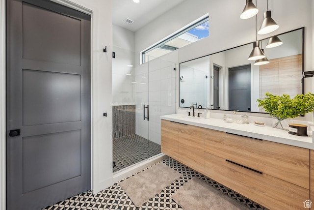11431 N Ursa Cir Unit 56, Heber City, UT 84032 - bathroom with visible vents, tile patterned floors, vanity, and a stall shower