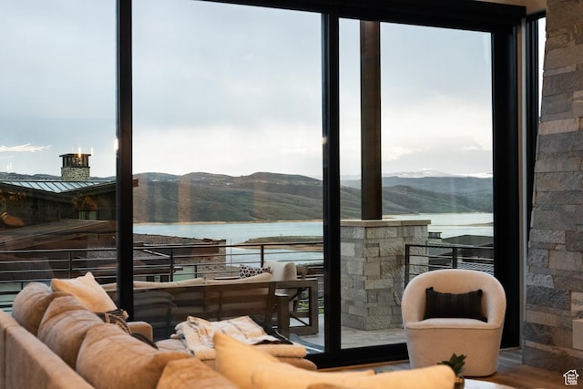 11431 N Ursa Cir Unit 56, Heber City, UT 84032 - interior space featuring an outdoor hangout area and a water and mountain view