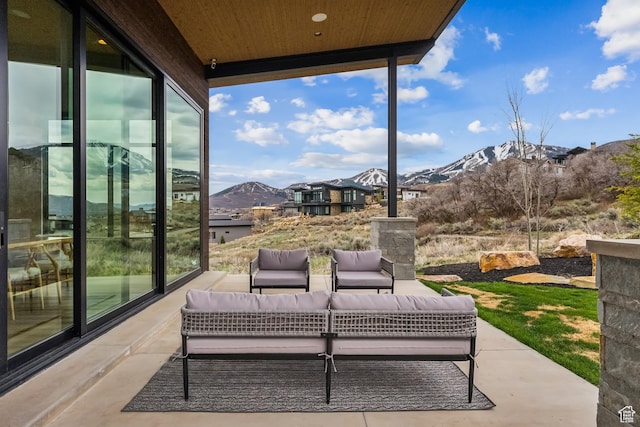 11431 N Ursa Cir Unit 56, Heber City, UT 84032 - view of patio featuring a mountain view and an outdoor living space