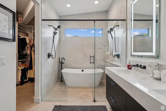 11431 N Ursa Cir Unit 56, Heber City, UT 84032 - full bathroom with a shower stall, a sink, a walk in closet, a soaking tub, and double vanity