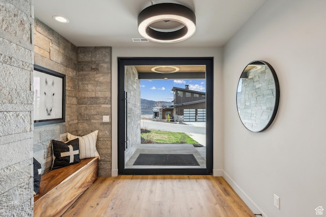 11431 N Ursa Cir Unit 56, Heber City, UT 84032 - doorway with visible vents, baseboards, and wood finished floors