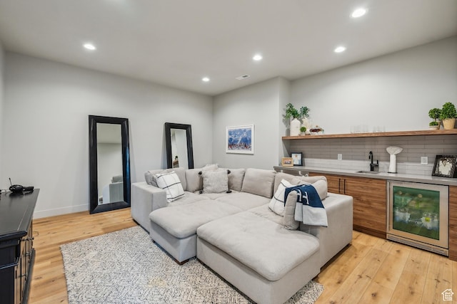 11431 N Ursa Cir Unit 56, Heber City, UT 84032 - living area with recessed lighting, wet bar, light wood finished floors, and wine cooler