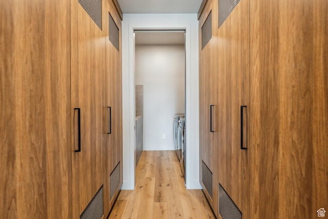 11431 N Ursa Cir Unit 56, Heber City, UT 84032 - walk in closet with visible vents, washer and clothes dryer, and light wood finished floors